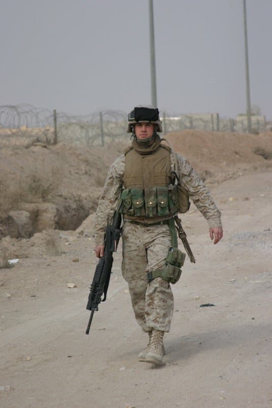 Michael Daniels patrolling a road in Iraq